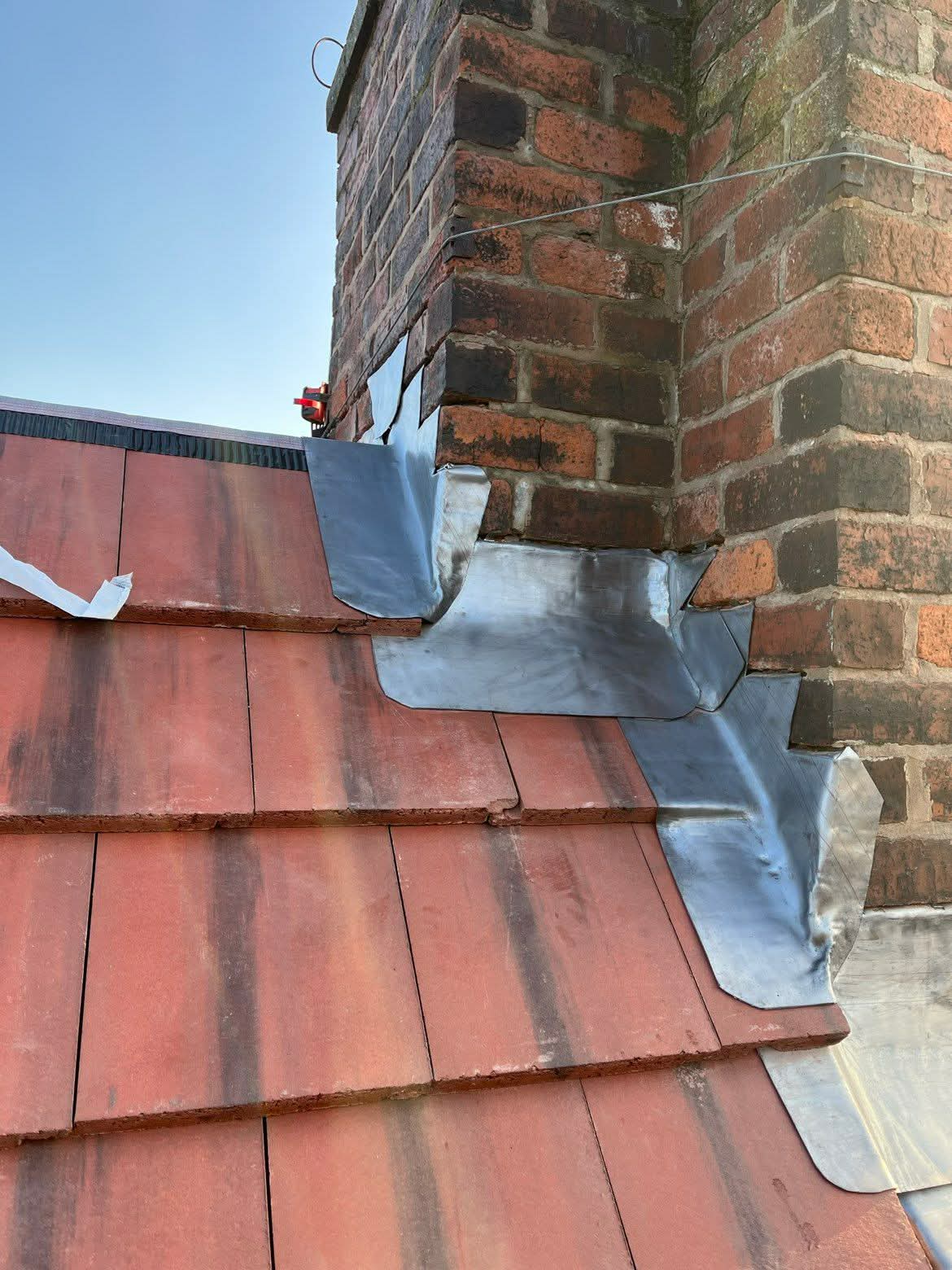 Chimney flashings and leadwork on a Hereford property